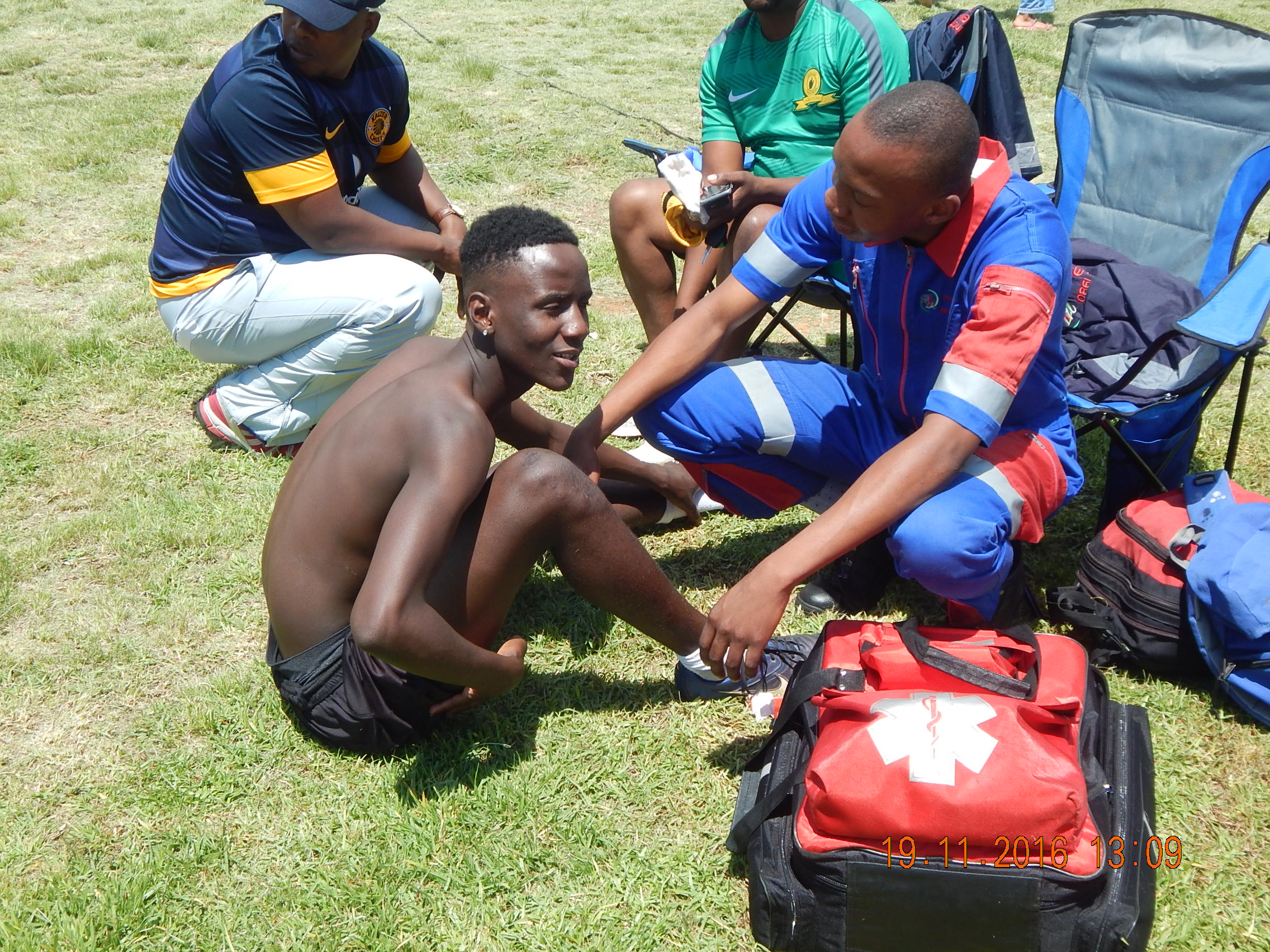Soccer player receiving minor medical attention